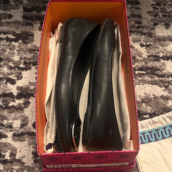 Tory Burch Black Flats with Silver Emblem - Picture 7 of 10